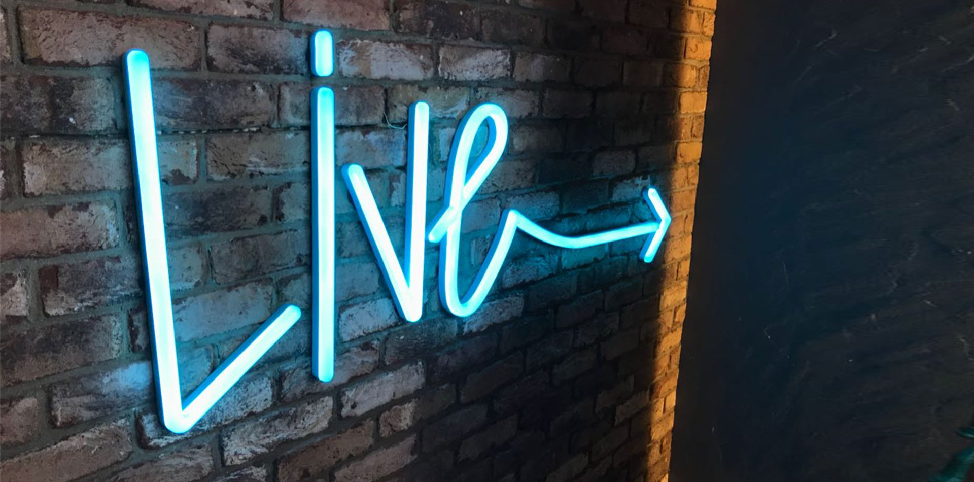 Neon Signage of Live